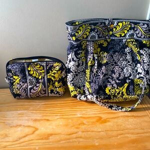 Set of matching Vera Bradley handbag and cosmetic bag.